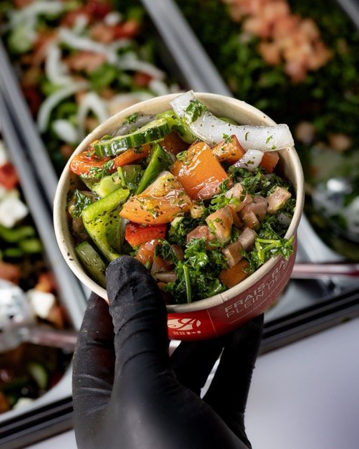 Amir food photography showing a meat and rice platter.
